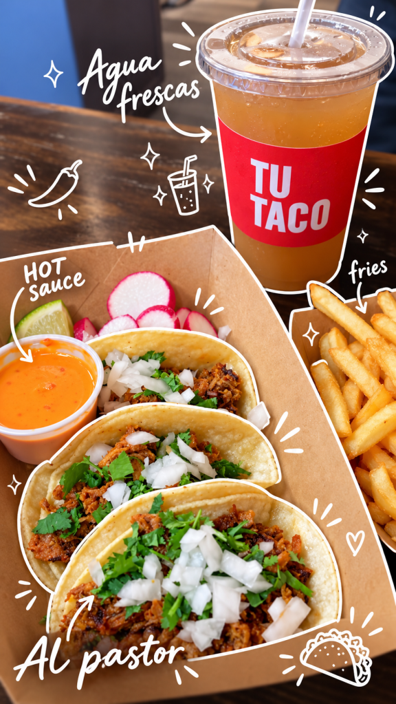 A serving of three al pastor tacos topped with onions and cilantro, accompanied by a side of hot sauce, sliced radishes, and lime, with a drink labeled 'TU TACO' and a side of fries.